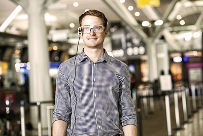 QUT eye tracking technology, worn by PhD researcher Levi Swann, is part of the university's Airport Innovation Research Lab program.