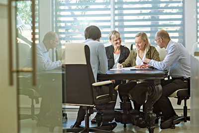 Mind matters: Michael Lang (right) conducts and SG Partners onsite workshop with clients.