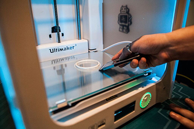 On of four printers in action at the pop-up 3D Print Shop in Brisbane.