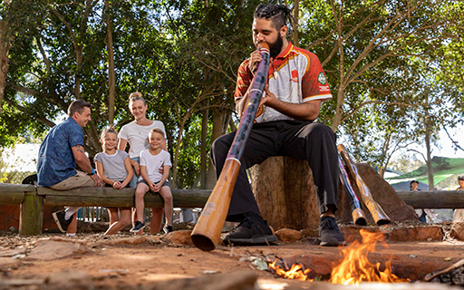 Dreamworld offers a multi-faceted theme park experience, including an authentic Aboriginal corroboree and traditional Indigenous music experience.